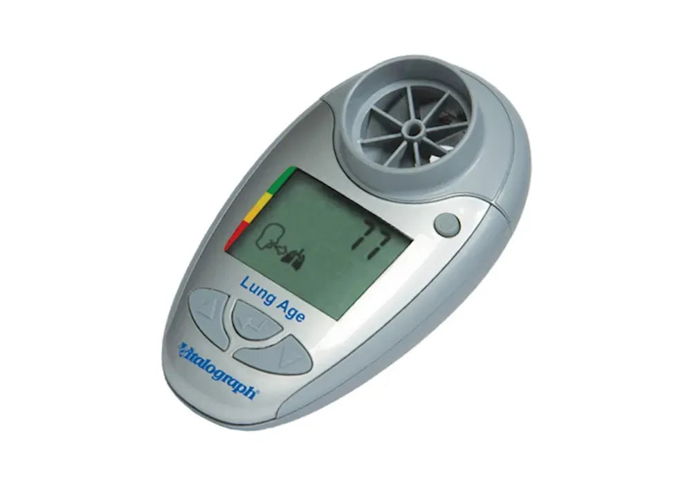 The Lung Age Meter is shown on, with a age score of 77 shown on the screen.  It is a grey and silver handheld device.